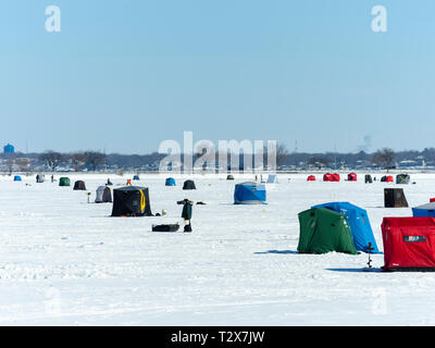 Ice fishing on Monona Bay, Madison, Wisconsin, USA. Stock Photo