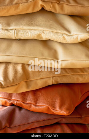 Various decorative pillows made from real leather Stock Photo