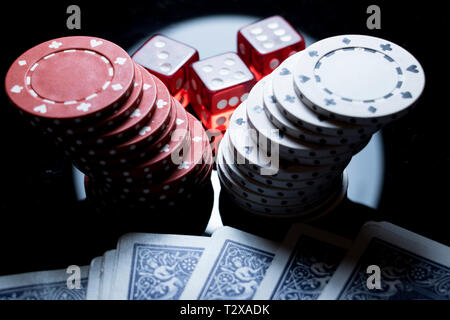 Casino concept poker chips, dice and cards. Feeling lucky gambling, Game on fun night out at the casino. Stock Photo