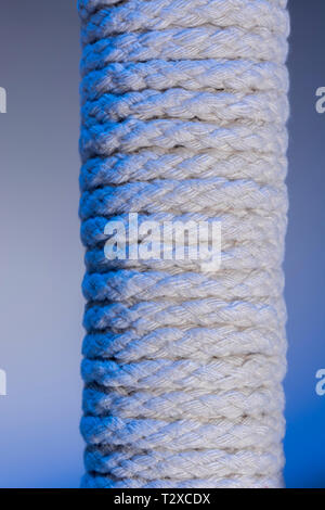 Close-up of a hank of natural multi-strand cotton cord - used for clotheslines and other jobs. Metaphor 'given enough rope'. Stock Photo