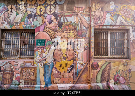Tainan, Taiwan - December 4, 2018: Beautiful scenic of street art and graffiti wall at Xinmei street in Tainan city, Taiwan. Stock Photo