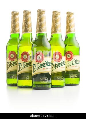 Pilsner Urquell lager beer bottle isolated on white background. Pilsner Urquell is a Czech beer. Stock Photo