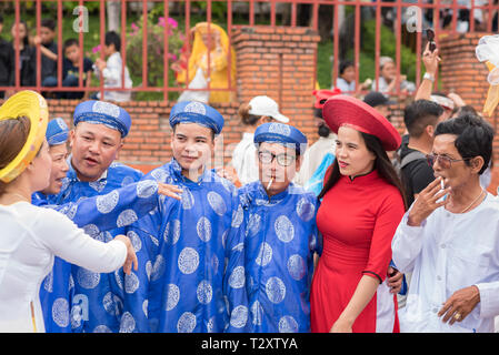 Nha Trang, Vietnam - May 5, 2018: men and women in traditional Vietnamese costumes at Po Nagar Temple celebration (Le hoi Thap Ba Ponagar). Stock Photo