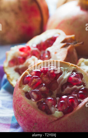 pomegranate cut open showing seeds Stock Photo