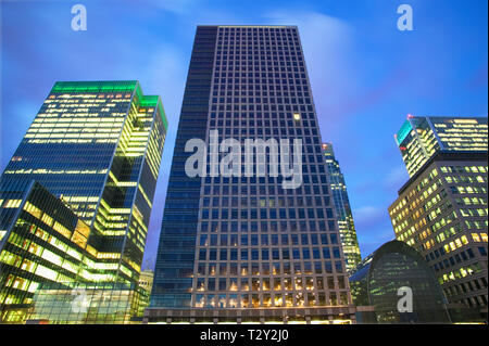 Single lit window in a modern office at dusk Stock Photo