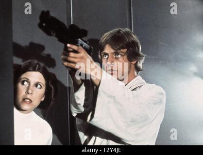 CARRIE FISHER, MARK HAMILL, STAR WARS: EPISODE IV - A NEW HOPE, 1977 Stock Photo