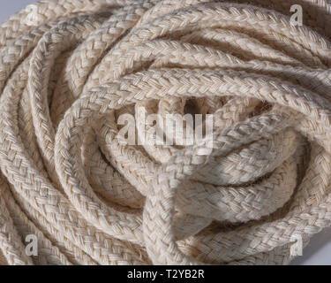 Macro close-up of unbleached diamond braided cotton spirit oil lamp wicks. Metaphor  intertwines, weaving, given enough rope Stock Photo - Alamy