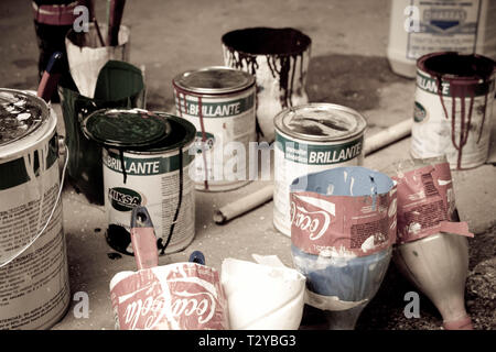 Cans and brushes of paint Stock Photo