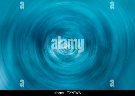 Abstract blue spinning circle with random light spots for background or wallpaper Stock Photo