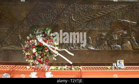 NEW YORK, NEW YORK, USA - SEPTEMBER 15, 2015: a close up of a wreath of flowers at a memorial to ny fire fighter killed on sept 11 in new york city Stock Photo