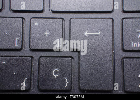 Macro of enter key on computer keyboard. Stock Photo