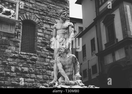 Florence, Italy - June 24, 2018: Closeup view of marble sculpture Hercules and Cacus by Bartolommeo Bandinelli in front of Palazzo Vecchio (Old Palace Stock Photo