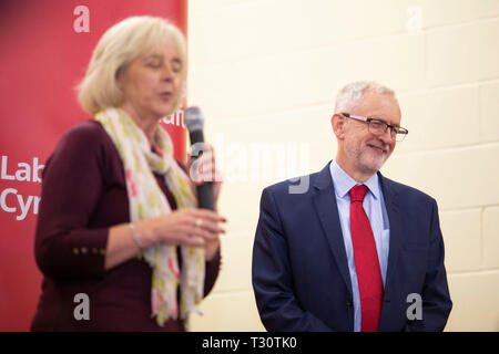 Newport, Wales, UK, April 5th 2019. Labour leader Jeremy Corbyn during a speech celebrating the by-election victory of Ruth Jones (left), the new MP for Newport West at Pill Millennium Centre in Newport. Credit: Mark Hawkins/Alamy Live News Stock Photo