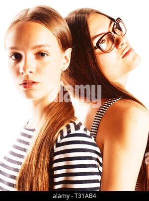 two young workers isolated on white, wearing same dresses in strip, glasses Stock Photo