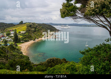 Coastline view from Tapeka Point Track with blue sky above in Russell, Northland, New Zealand. Stock Photo