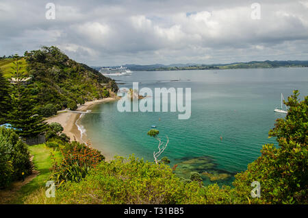 Coastline view from Tapeka Point Track with blue sky above in Russell, Northland, New Zealand. Stock Photo