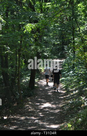 Tourists exploring woods at Aladzha Monastery, Golden Sands Near Varna, Bulgaria Stock Photo