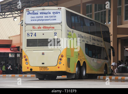 Chiangmai, Thailand - Auguest  11 2012: Bus of Phetprasert tour company. Photo at  Chiangmai bus station. Stock Photo