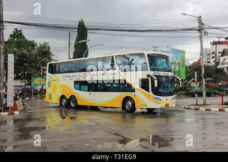 Chiangmai, Thailand - Auguest  11 2012: Bus of Phetprasert tour company. Photo at  Chiangmai bus station. Stock Photo