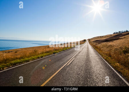 A sunny Summer afternoon on Cattle Point Road, San Juan Island, Washington, USA. Stock Photo