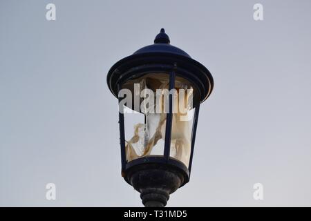 Fire damaged light on Eastbourne Pier after fire in 2014. Sussex UK Stock Photo