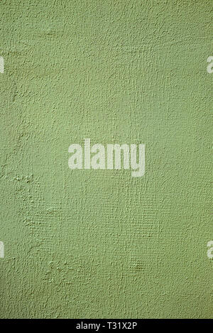 Wall insulated with foam plastic and caver by green plaster. Vertical background Stock Photo