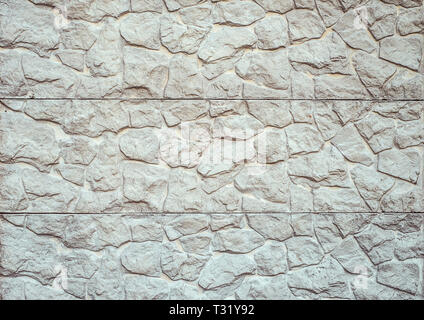Old Grey Wall Texture From Three Parts Of Stouns Of Fence. Horizontal texture Stock Photo
