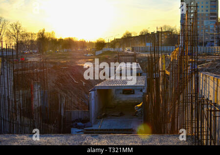 Monolithic concrete structure in the foundation pit during the construction of a new underground pedestrian crossing in the subway Stock Photo