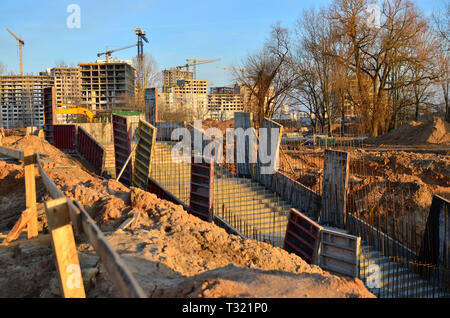 Monolithic concrete structure in the foundation pit during the construction of a new underground pedestrian crossing in the subway Stock Photo
