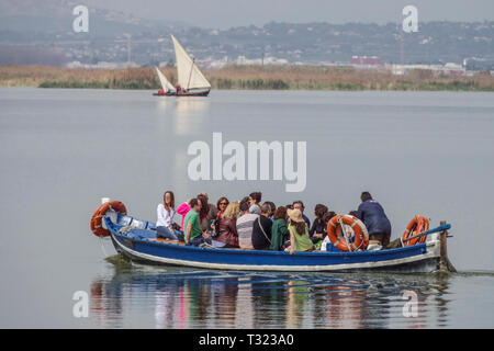 People, trip boat on the lake in Albufera Natural Park, Albufera Valencia Spain tourism Europe Stock Photo