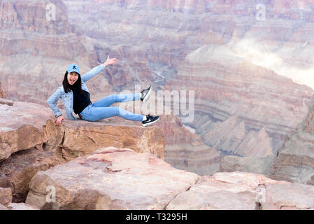 GRAND CANYON - February 19: Tourists take pictures at Eagle Point at Grand Canyon West Rim on February 19, 2017 in Grand Canyon, AZ Stock Photo