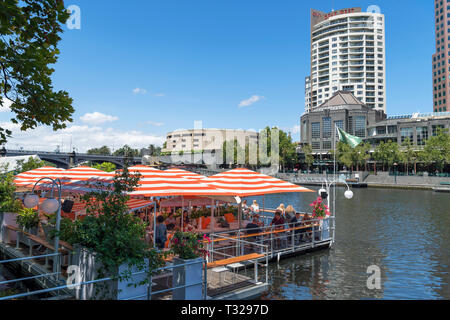 Arbory Afloat floatiing bar and restaurant on the Yarra River looking towards Southbank, Melbourne, Victoria, Australia Stock Photo