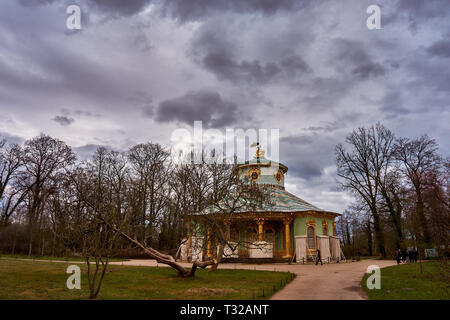 Beautiful scenery from the park of the Grand Sanssouci summer palace against a cloudy sky in Potsdam, state Brandenburg. Germany. Stock Photo