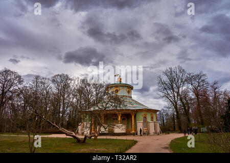 Beautiful scenery from the park of the Grand Sanssouci summer palace against a cloudy sky in Potsdam, state Brandenburg. Germany. Stock Photo
