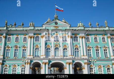 Russia, Saint-Petersburg, 04 April 2019: Palace square, Hermitage museum, Alexander column at sunny spring day, a lot of people, tourists and guests o