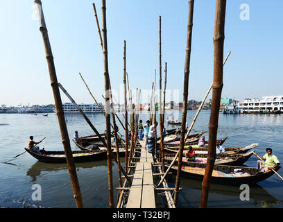 Wooden taxi boats on the Buriganga river in Dhaka, Bangladesh. Stock Photo