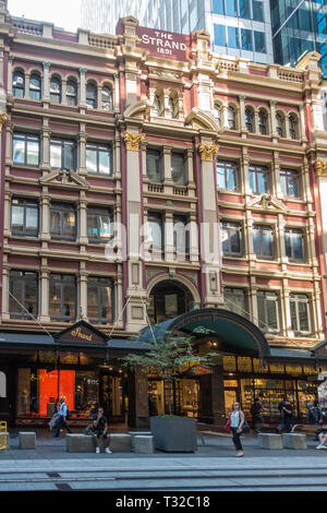 Sydney, Australia - February 12, 2019: Historic and Iconic The Strand Building in George Street. Luxury shops and people in the street. Stock Photo