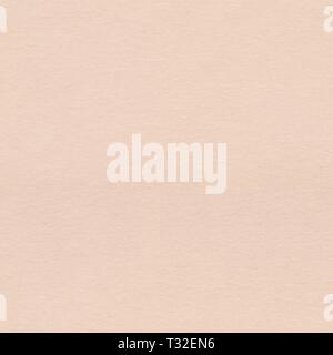 Light beige paper with vintage grunge texture. Seamless square background, tile ready. Stock Photo