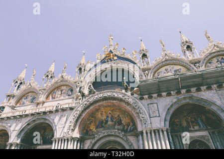 Venice, Italy - June 30, 2018: Closeup facade of Patriarchal Cathedral Basilica of Saint Mark (Basilica Cattedrale Patriarcale di San Marco) Stock Photo