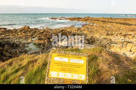 Auderville, Normandy, France - August 27, 2018: The road sign coastal path or sentier du littoral. Cap de la Hague , Normandy France Stock Photo