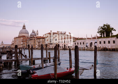 Venice, Italy - June 30, 2018: Panoramic view of Venice grand canal view with historical buildings and boats, away of Basilica Salute. Landscape of su Stock Photo