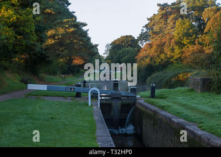 Looking up the famous Audlem Lock Flight on the Shropshire Union Canal from Lock 11, Audlem, Cheshire, England Stock Photo