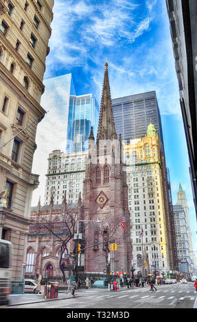 Trinity Church is near the intersection of Wall Street and Broadway, in New York City, NY. Stock Photo