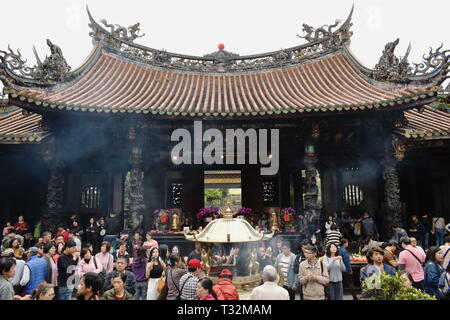 Taipei Taiwan March, 30 2019 : Buddhism praying and offering god in Longshan Temple Stock Photo