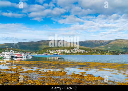 View of Eidkjosen on Kvaloya island in Troms county across the fjord, Norway Stock Photo