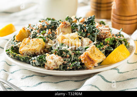 Homemade Kale Quinoa Caesar Salad with Cheese Stock Photo