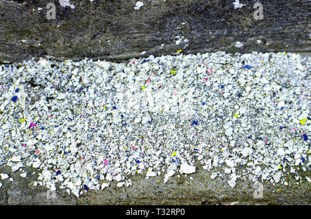 Old crumbling paint from concrete wall, abstract background Stock Photo