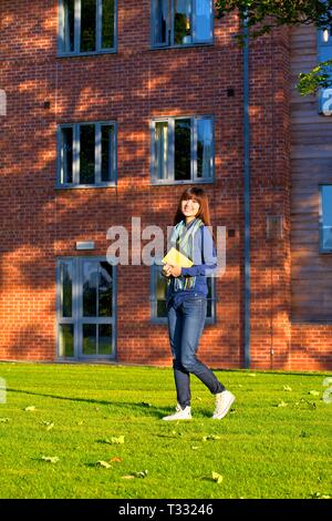 Asian Female Student Studying Stock Photo