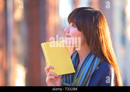 Asian Female Student Studying Stock Photo