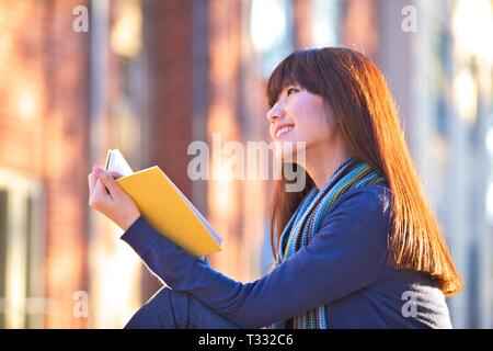 Asian Female Student Studying Stock Photo